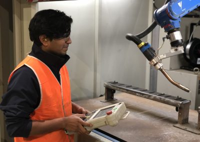Akshay showcasing robot welder